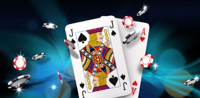 Playing cards with poker chips flying against a dark blue glowing background